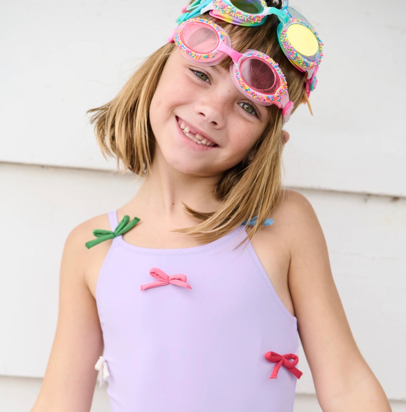 Pink Chicken | Girls Lottie Suit - Lavender Multi Bow Applique